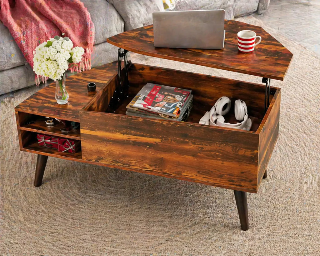 Wooden coffee table with lift-top design, displaying a laptop, mug, and books in a living room setting.