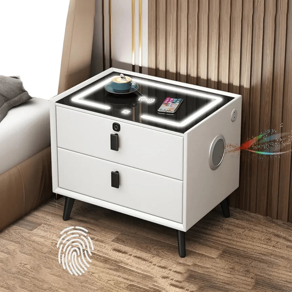White nightstand with LED lighting and smartphone charging, placed next to a bed.